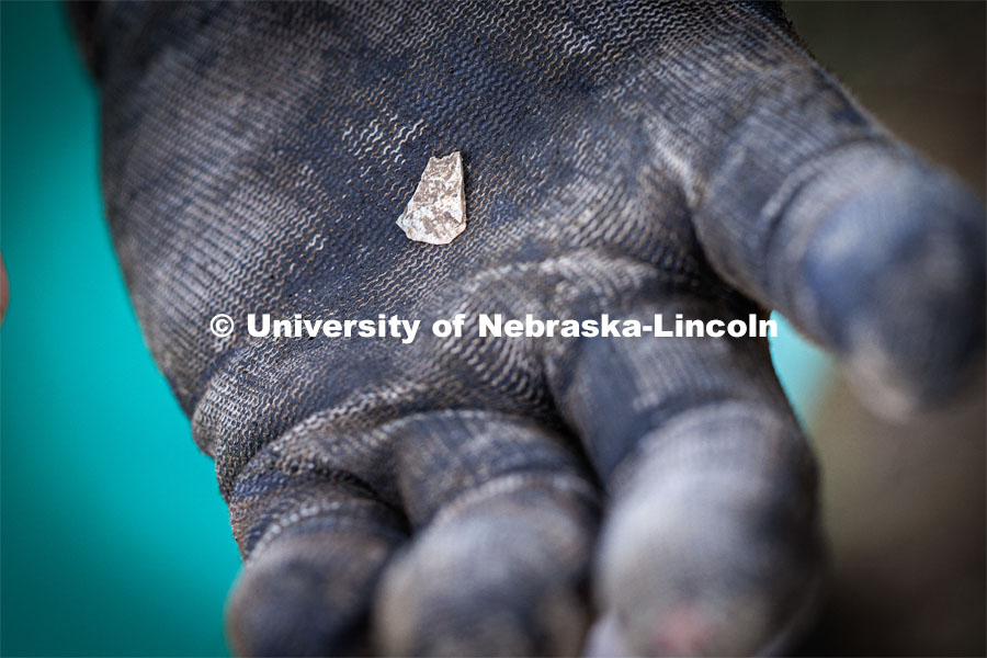 A shard found at the Reller Prairie site. LuAnn Wandsnider is leading anthropology and forensic anthropology digs at the Reller Prairie in southwest Lancaster County. June 9, 2023. Photo by Craig Chandler / University Communication.