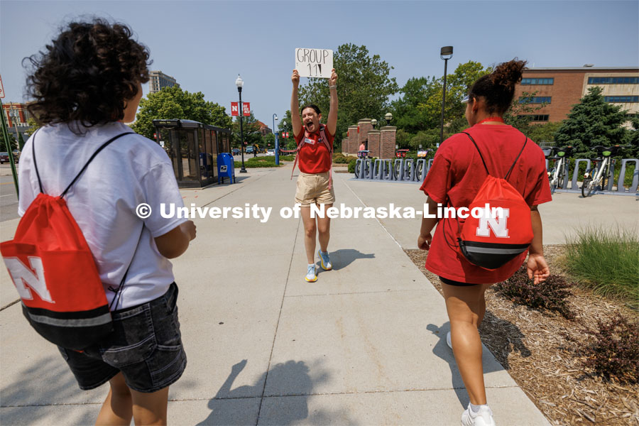 Orientation Leader Maddie Ames leads her NSE group toward Love Library. New Student Enrollment ( NSE ) on City Campus. June 13, 2023. Photo by Craig Chandler / University Communication.