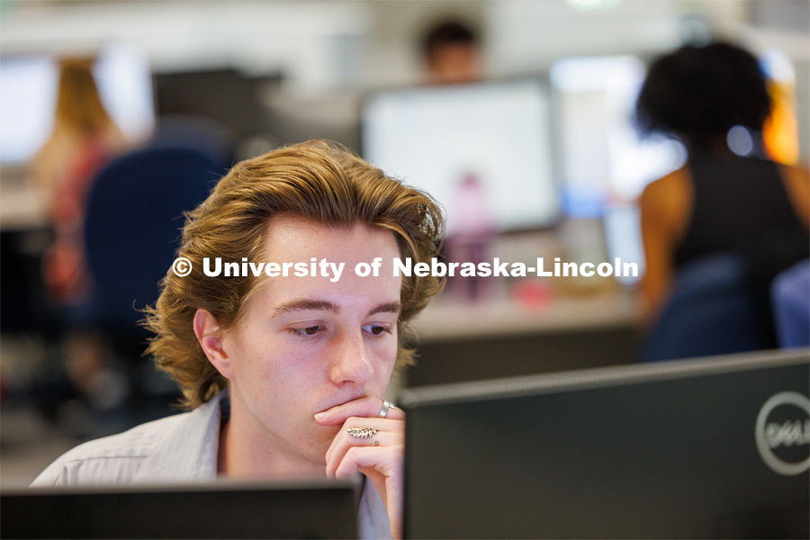 Ethan Dunn, an UNL UCARE student, works on researching a case. Students in Research Experiences for Undergraduates summer program are working to study how various marginalized groups in American history used the law to contest and advance their rights. June 14, 2023. Photo by Craig Chandler / University Communication.