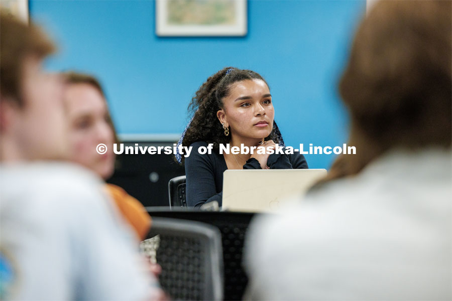 Isabelle Childs of the University of Oklahoma listens to Katrina Jagodinsky explain their next presentation. Students in Research Experiences for Undergraduates summer program are working to study how various marginalized groups in American history used the law to contest and advance their rights. June 14, 2023. Photo by Craig Chandler / University Communication.