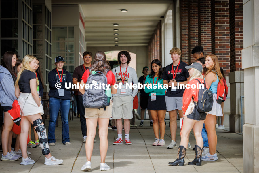 New students wait out front of the Nebraska Union on City Campus for their tour to start. New Student Enrollment. July 6, 2023. Photo by Craig Chandler / University Communication. 