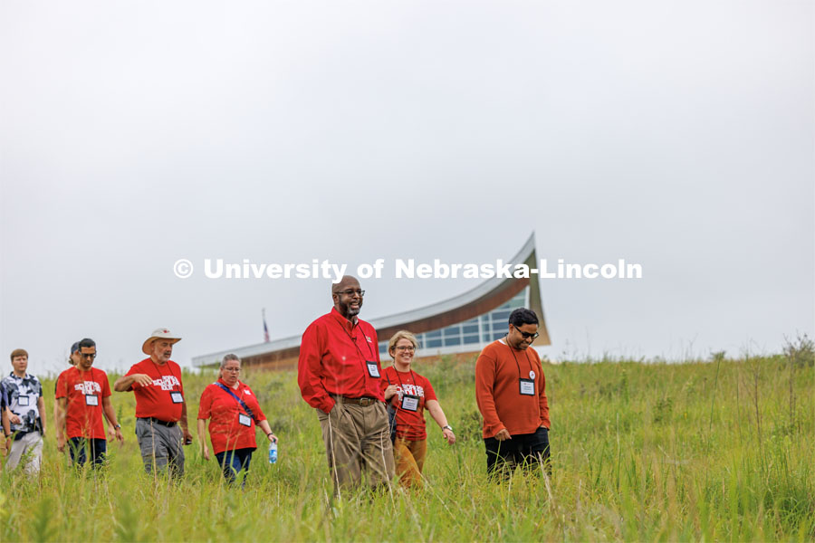 Chancellor Rodney Bennett and the tour group walks the grounds at the Homestead National Historic Park near Beatrice. IANR Roads Scholar Tour through Nebraska. August 1, 2023. Photo by Craig Chandler / University Communication.
