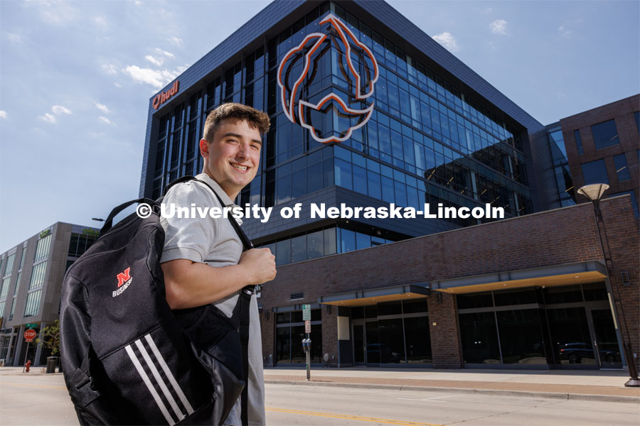 Jack Kinney of Omaha was one of the first Huskers to declare the new interdisciplinary business and law major. Only offered by a handful of business schools, the new major addresses a critical shortage of mid- and upper-level managers with legal knowledge. Kinney is pictured in front of Hudl a business in Lincoln’s Haymarket downtown. August 12, 2023. Photo by Craig Chandler / University Communication and Marketing.