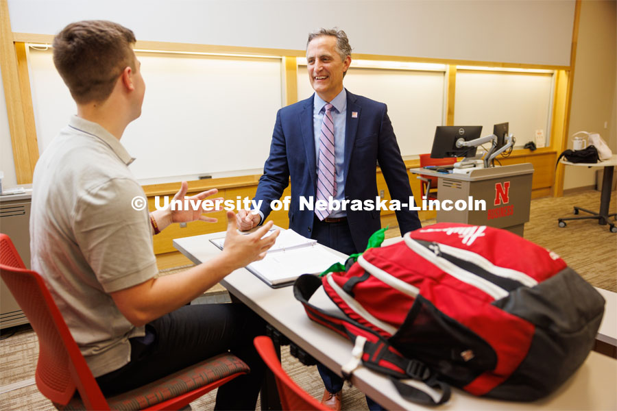Jack Kinney of Omaha with Richard Moberly, dean of the College of Law, was one of the first Huskers to declare the new interdisciplinary business and law major. Only offered by a handful of business schools, the new major addresses a critical shortage of mid- and upper-level managers with legal knowledge. Kinney and Dean Moberly are pictured in a Hawks Hall classroom. August 12, 2023. Photo by Craig Chandler / University Communication and Marketing.