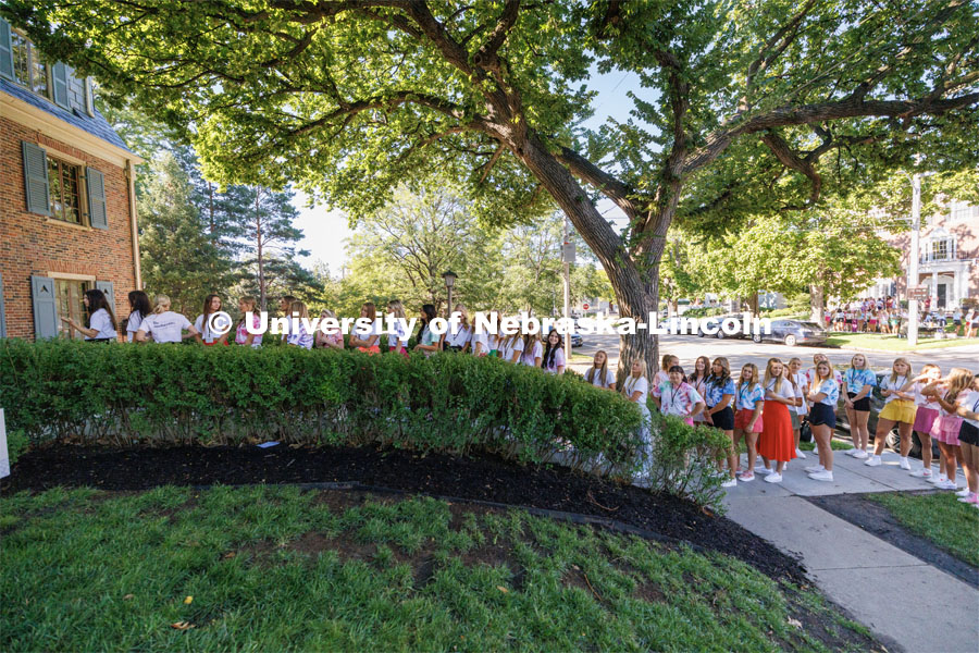Lines form in front of Pi Beta Phi as those rushing await the next event. Sorority Recruitment. August 15, 2023. Photo by Craig Chandler/ University Communication.