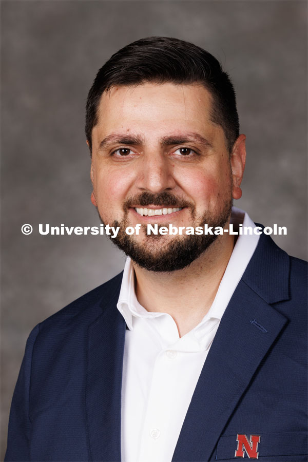 Studio portrait of Milad Mohebali, Assistant Professor in Educational Administration. 2023 New Faculty Orientation. August 16, 2023. Photo by Craig Chandler / University Communication.