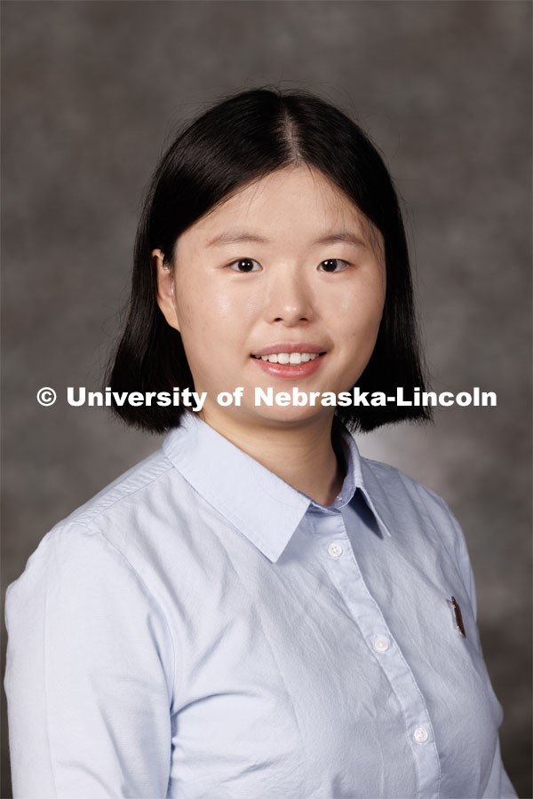Studio portrait of Tianjing Zhao, Assistant Professor of Theoretical Quantitative Genetics, Animal Sciences. 2023 New Faculty Orientation. August 16, 2023. Photo by Craig Chandler / University Communication.