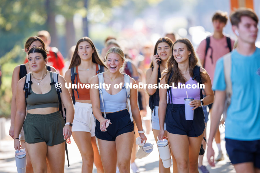 Its a hot and humid day as students cross campus to get to classes on the first day of classes for fall semester. August 21, 2023 Photo by Craig Chandler / University Communication. 