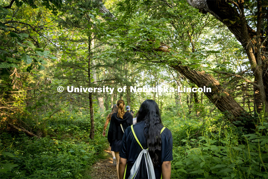 Avni Srivastav (front) and Caroline Gidlow take a nature walk at Prairie Pines. About Lincoln at Prairie Pines. August 29, 2023. Photo by Kristen Labadie / University Communication.