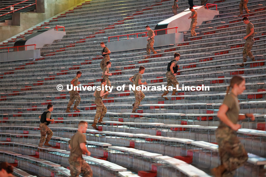 Army ROTC cadets spring up the steps in Memorial Stadium. ROTC cadets and midshipmen run 110 flights of stairs at Memorial Stadium in honor of the first responders who climbed the stairs of the World Trade Center on 9/11. September 11, 2023. Photo by Craig Chandler / University Communication.