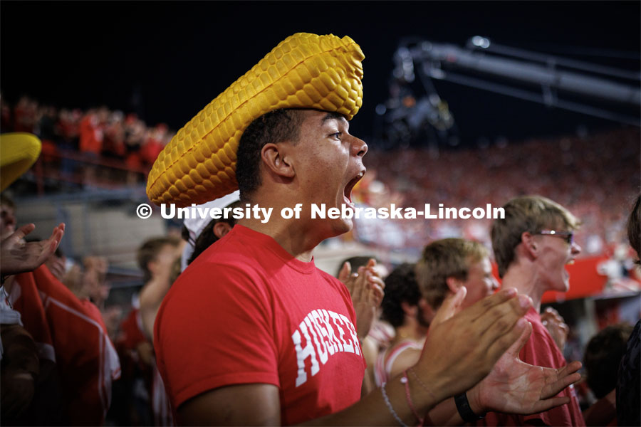 Dillon Parker, a freshman from California, cheers on the Huskers. Northern Illinois football in Memorial Stadium. September 16, 2023. Photo by Craig Chandler / University Communication.