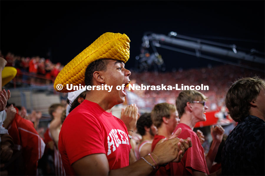 Dillon Parker, a freshman from California, cheers on the Huskers. Northern Illinois football in Memorial Stadium. September 16, 2023. Photo by Craig Chandler / University Communication.