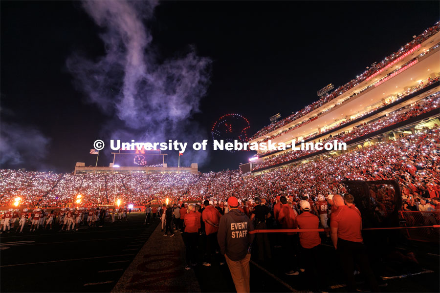 Husker fans light up the night during the light show between the 3rd and 4th quarters. Northern Illinois football in Memorial Stadium. September 16, 2023. Photo by Craig Chandler / University Communication.