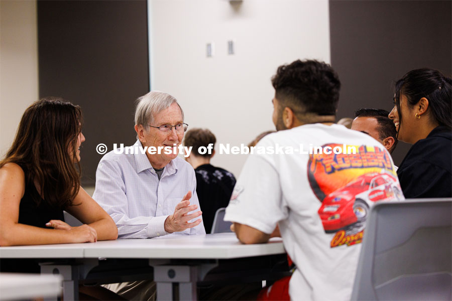 Jim Lewis (second from left), professor emeritus of mathematics, talks with a group of students funded by the STEM CONNECT project. In 2019, Lewis and colleagues received a $3.5 million grant for the project, which helps low-income students pursue degrees in STEM fields. September 19, 2023. Photo by Craig Chandler / University Communication.