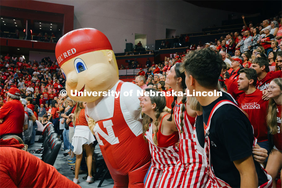 Lil Red helps cheer on the Nebraska volleyball team. Nebraska volleyball fans. September 22, 2023. Photo by Kristen Labadie / University Communication. 