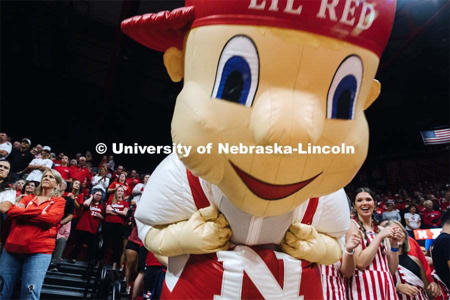 Lil Red helps cheer on the Nebraska volleyball team. Nebraska volleyball fans. September 22, 2023. Photo by Kristen Labadie / University Communication. 
