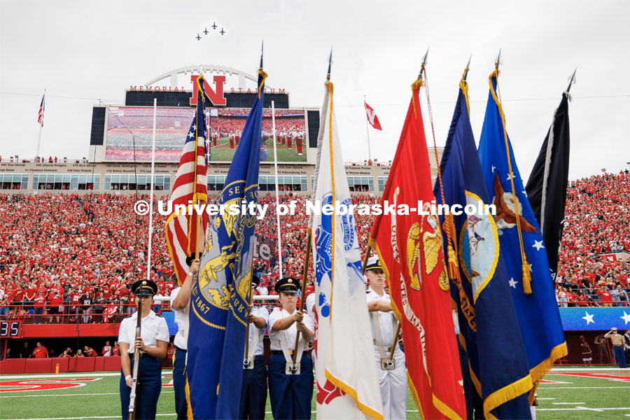 ROTC color guard presents the colors as an Air Force T-38 formation flies over the stadium. Nebraska football vs. Louisiana Tech. August 23, 2023. Photo by Craig Chandler/ University Communication.