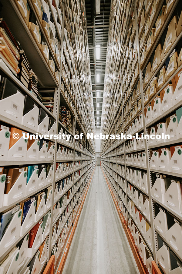 Aisles show some of the 900,000 + books are kept in the Library Depository Retrieval Facility on East Campus. September 29, 2023. Photo by Craig Chandler / University Communication and Marketing
