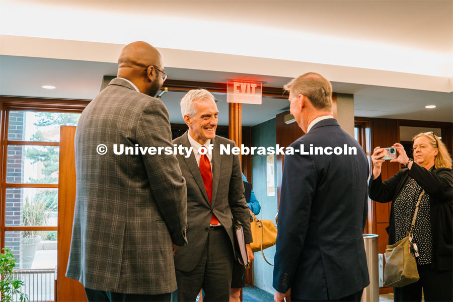 Chancellor Rodney Bennett and President Ted Carter greet U.S. VA Secretary Denis McDonough. McDonough visited Nebraska U to discuss the ongoing implementation of expanded health care services for veterans. October 12, 2023. Photo by Matthew Strasburger / University Communication.