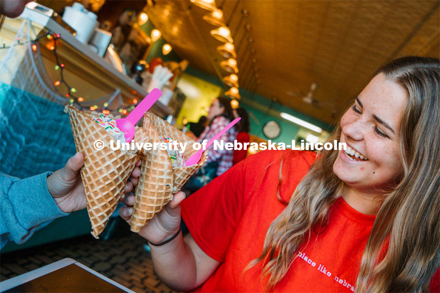Cora Scott enjoys a waffle cone at Ivanna Cone. About Lincoln at Ivanna Cone in the Haymarket. October 20, 2023. Photo by Matthew Strasburger / University Communication.