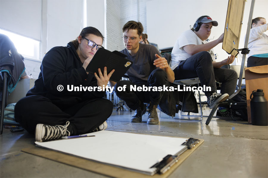 Casey Beck works with students in the Drawing 101 class in Richards Hall. November 29, 2023. Photo by Craig Chandler / University Communication and Marketing.