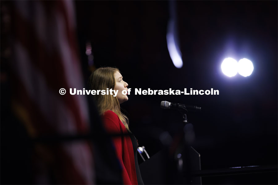 Sarah Wibben performs the national anthem. Graduate Commencement at Pinnacle Bank Arena. December 15, 2023. Photo by Craig Chandler / University Communication and Marketing.