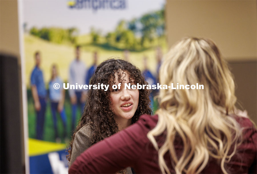 Marissa Davis talks with recruiters at the East Campus Career Fair. February 8, 2024. Photo by Craig Chandler / University Communication and Marketing.