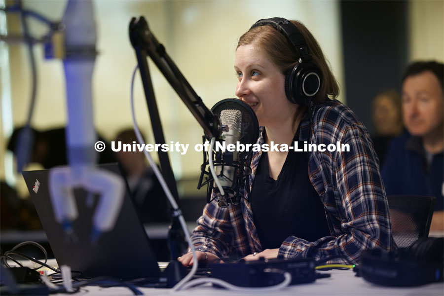 Rachael Wagner, a Husker doctoral student, talks with NASA mission control in Huntsville, Alabama, as she readies the surgical robot test with the International Space Station. Nebraska Engineering professor and Virtual Incision founder Shane Farritor successfully performed robotic surgery on the International Space Station. Controlled from the Virtual Incision offices in Lincoln, NE, surgeons cut rubber bands–mimicking surgery–inside a payload box on the International Space Station. February 10, 2024. Photo by Craig Chandler / University Communication and Marketing.