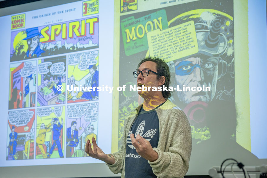 Richard Graham introduces Will Eisner, the comic book artist his Graphic Novels as History (HIST 256) class is discussing this week. April 16, 2024. Photo by Kristen Labadie / University Communication.