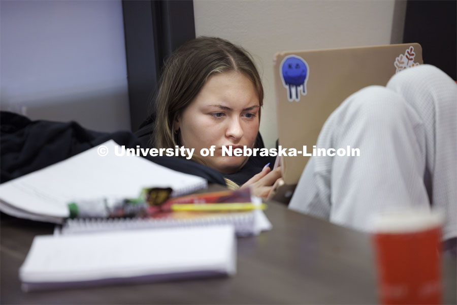 Lauren Gieselman, a sophomore from Omaha, studies for a chemistry exam from a booth in the Nebraska Union on City Campus. May 2, 2024. Photo by Craig Chandler / University Communication and Marketing.