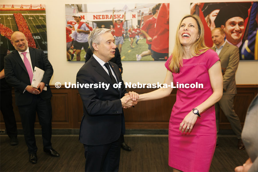 Canadian Minister Francois-Philippe Champagne, makes Jill O’Donnell of the Yeutter Institute laugh after being introduced to each other. Champage is on campus today to have a fireside chat with Jill O’Donnell of the Yeutter Institute. May 3, 2024. Photo by Craig Chandler / University Communication and Marketing.