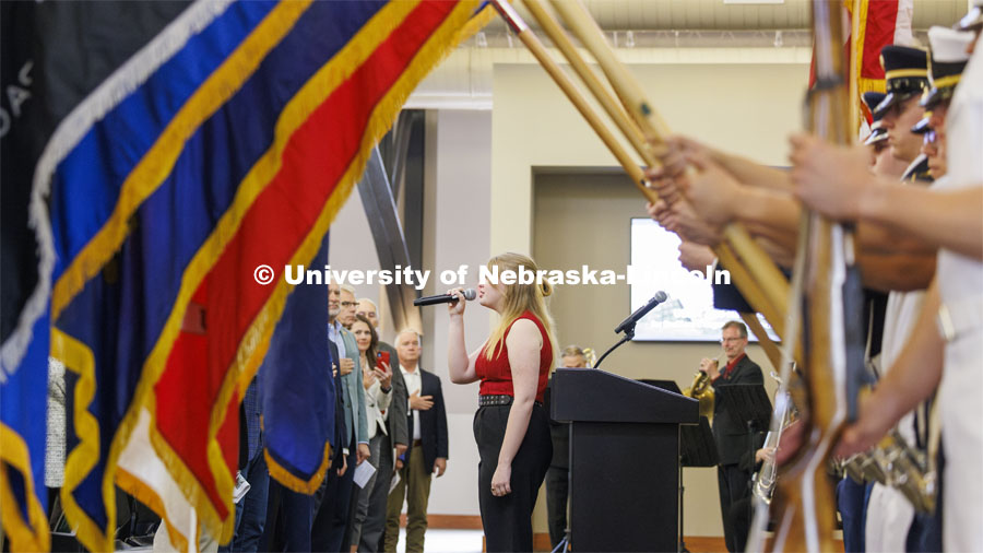 Elisa Anderson sings the national anthem. The U.S. Department of Agriculture's (USDA's) Agricultural Research Service (ARS), the University of Nebraska–Lincoln (UNL), and Nebraska Innovation Campus held a groundbreaking ceremony today to launch the construction of the National Center for Resilient and Regenerative Precision Agriculture. May 6, 2024. Photo by Craig Chandler / University Communication and Marketing.