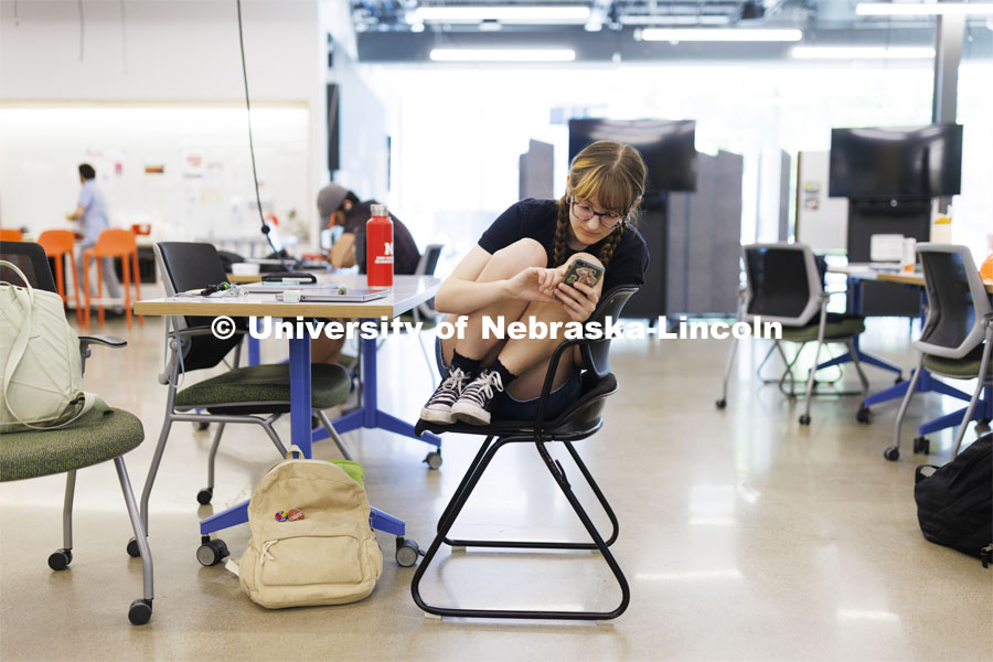 Vivian Ostrander takes a break as students in the Carson Emerging Media Arts building work on their projects in preparation for Friday’s Spring 2024 Open Studios event at the center. May 8, 2024. Photo by Craig Chandler / University Communication and Marketing.