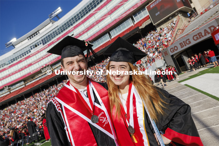 Jack Kinney and his twin, Hannah-Kate Kinney are wearing big smiles for commencement. Undergraduate Commencement in Memorial Stadium. May 18, 2024. Photo by Craig Chandler / University Communication and Marketing.