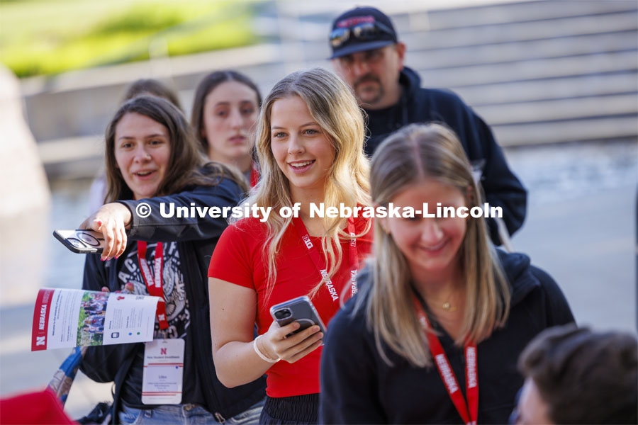 A group waits for their campus tour to start at New Student Enrollment. May 29, 2024. Photo by Craig Chandler / University Communication and Marketing.