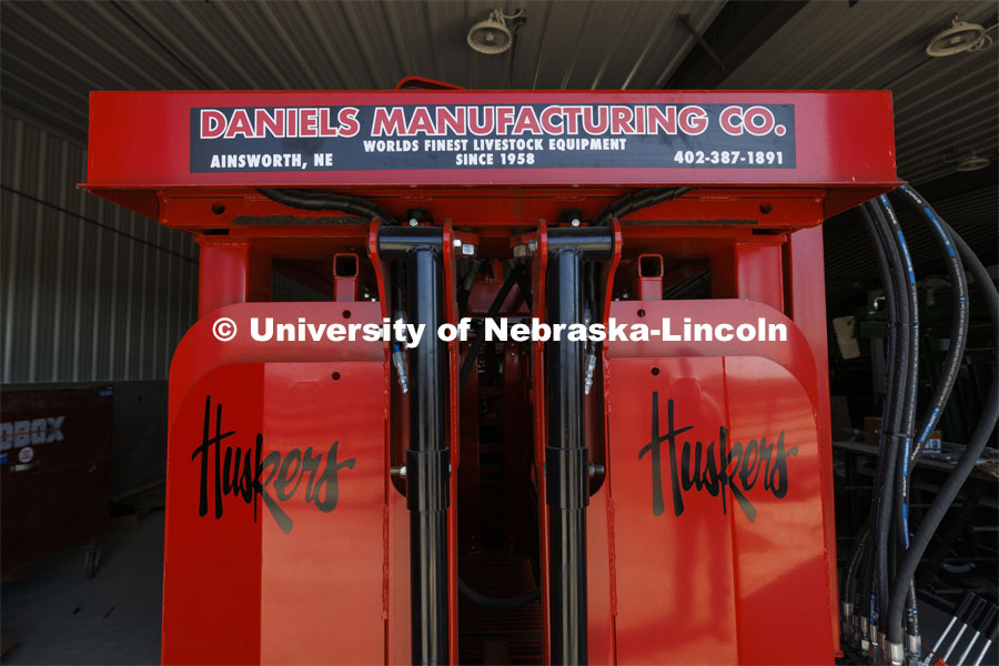 A hydraulic squeeze chute is ready for the beef. The handling equipment at the new center was donated by Daniels Manufacturing Company of Ainsworth, Nebraska. Feedlot Innovation Center at the Eastern Nebraska Research, Extension and Education Center (ENREEC) near Mead, Nebraska. June 21, 2024. Photo by Craig Chandler / University Communication and Marketing.