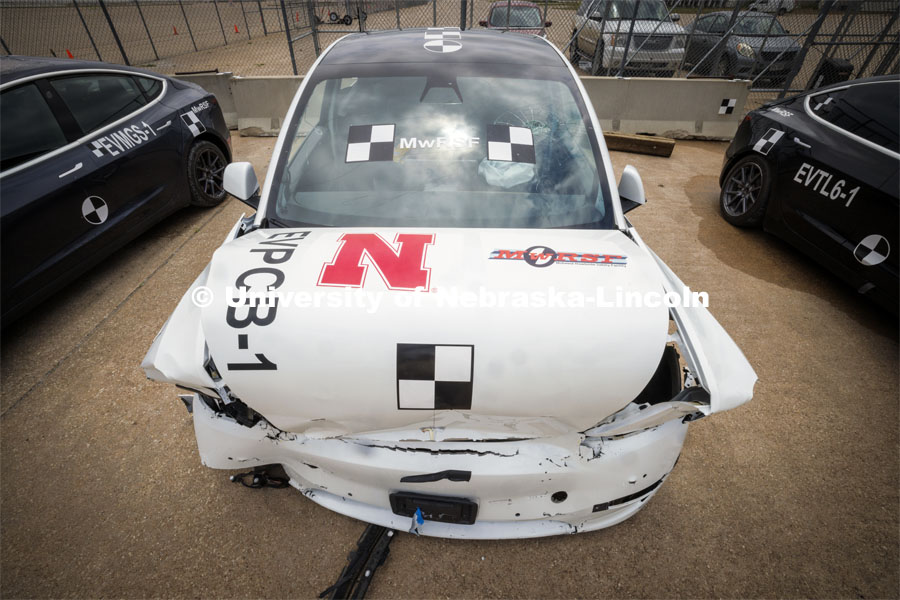 Research sponsored by the U.S. Army Engineer Research and Development Center. The University of Nebraska-Lincoln’s Midwest Roadside Safety Facility is investigating the safety questions raised by the burgeoning number of electric vehicles on the nation’s roadways by performing crash test performed on a guardrail at 62 mph, the 7,000-plus-pound, Rivian R1T truck crashed into a temporary barrier. The barrier deflected several feet but the truck did not go through the barrier. July 1, 2024. Photo by Craig Chandler / University Communication and Marketing.