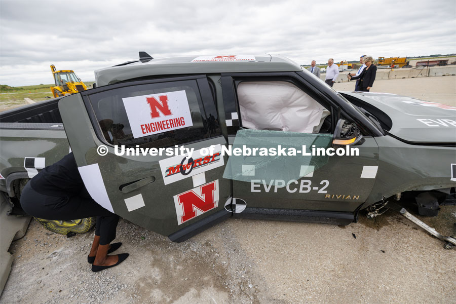 Research sponsored by the U.S. Army Engineer Research and Development Center. The University of Nebraska-Lincoln’s Midwest Roadside Safety Facility is investigating the safety questions raised by the burgeoning number of electric vehicles on the nation’s roadways by performing crash test performed on a guardrail at 62 mph, the 7,000-plus-pound, Rivian R1T truck crashed into a temporary barrier. The barrier deflected several feet but the truck did not go through the barrier. July 1, 2024. Photo by Craig Chandler / University Communication and Marketing.