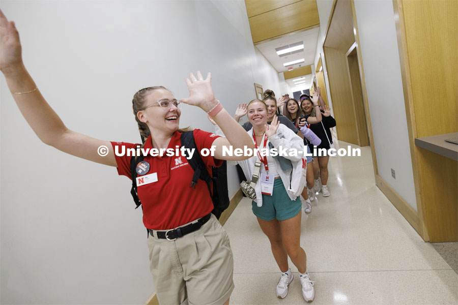 NSE student group tours Hawks Hall. Final day of 2024 New Student Enrollment. Campus tour in Hawks Hall College of Business. July 11, 2024. Photo by Craig Chandler / University Communication and Marketing.