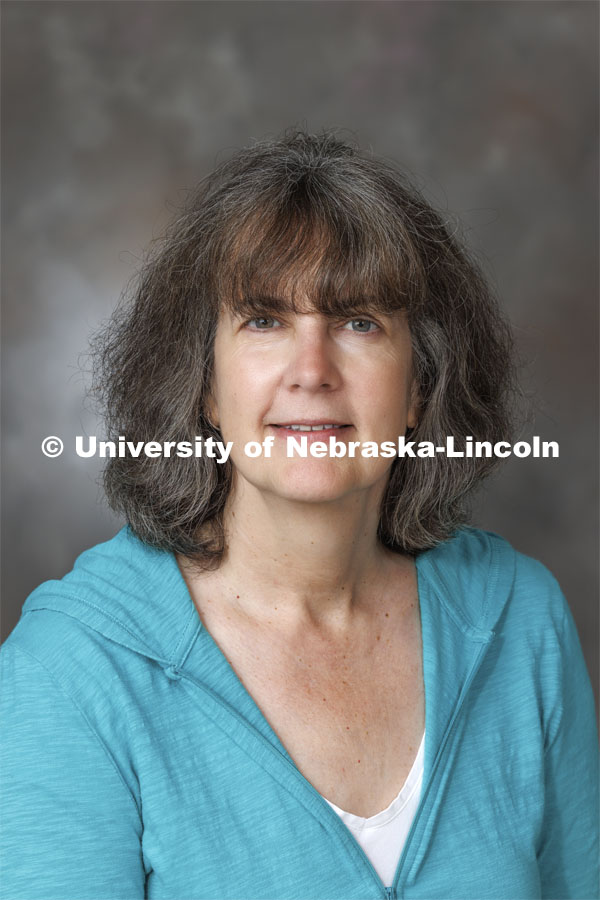 Studio portrait of Deborah Minter, Associate Professor, English. August 14, 2024. Photo by Craig Chandler / University Communication and Marketing.