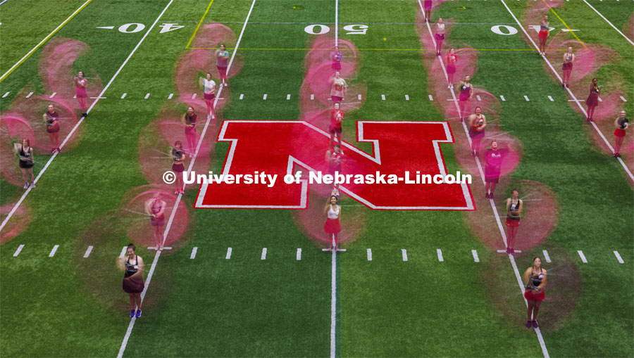 Color guard’s first fall Cornhusker Marching Band practice in Cook Pavilion. August 16, 2024. Photo by Craig Chandler / University Communication and Marketing.