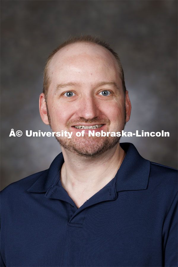 Studio portrait of Robert Anderson, Visiting Assistant Professor of Musicology, Glenn Korff School of Music. August 21, 2024. Photo by Craig Chandler / University Communication and Marketing.