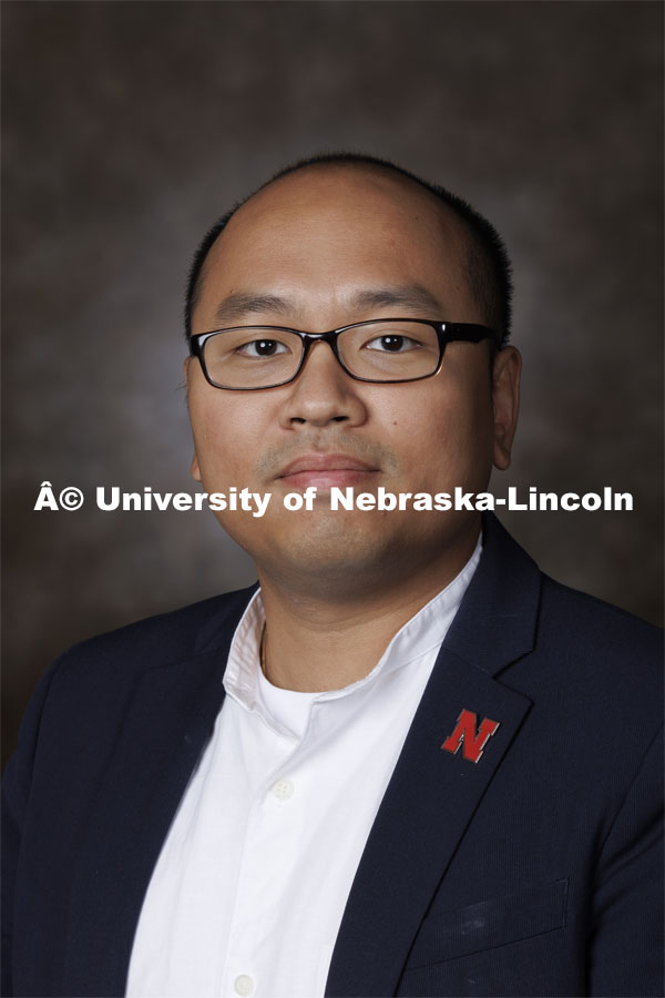 Studio portrait of Nam Le, Assistant Professor of Practice, Finance. August 21, 2024. Photo by Craig Chandler / University Communication and Marketing.