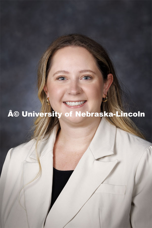 Studio portrait of Lexie Unhjem, Assistant Professor, Child, Youth and Family Studies. August 21, 2024. Photo by Craig Chandler / University Communication and Marketing.