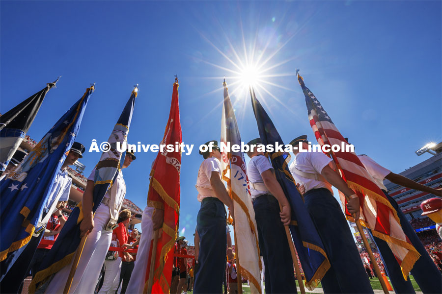 The ROTC color guard carry the flags onto the field at the Nebraska football game vs UTEP. August 31, 2024. Photo by Craig Chandler / University Communication and Marketing.