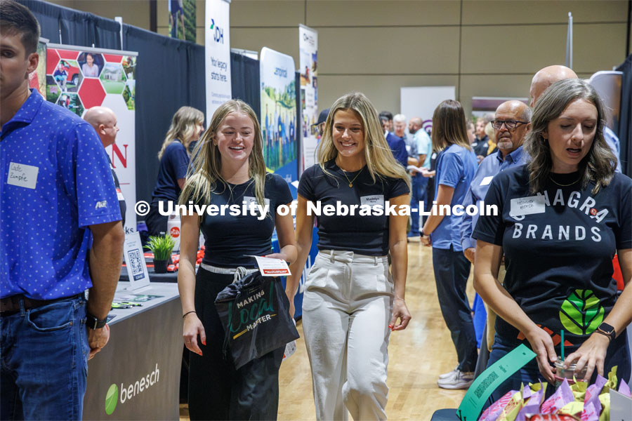 Cassidy Wortman (left) and Madelyn Martin, both Marketing majors, walk through the East Campus Career Fair. September 16, 2024. Photo by Kristen Labadie / University Communication.