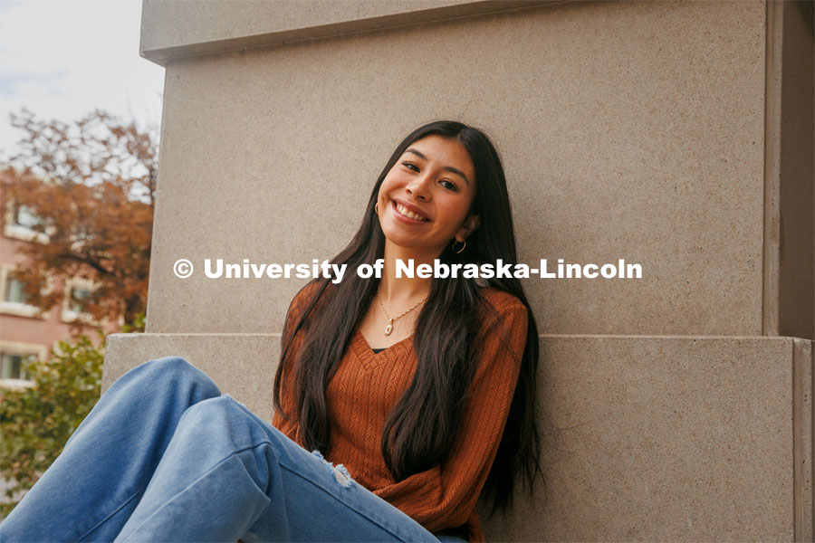 Rubi Hernandez Ochoa, a sophomore Advertising and Public Relations major, sits outside the Jackie Gaughan Multicultural Center. September 17, 2024. Photo by Kristen Labadie / University Communication.