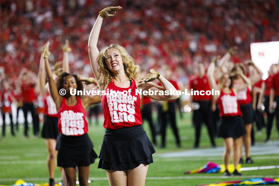 Cornhusker Marching Band Color Guard perform at the Nebraska vs. Illinois football game. September 20, 2024. Photo by Craig Chandler / University Communication and Marketing.