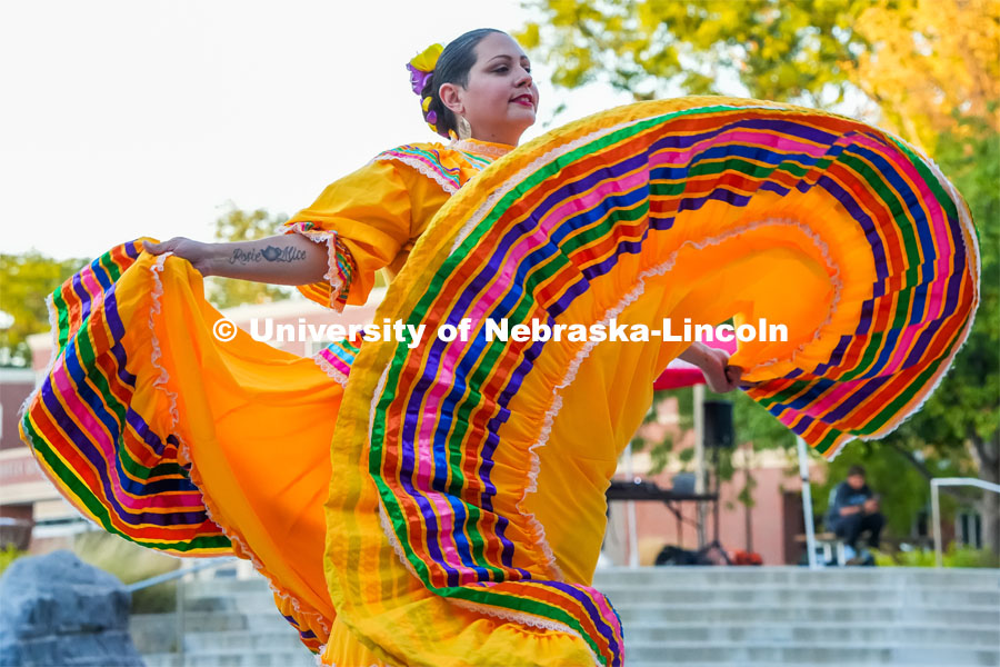 Rikki Neumann, a dancer from Lincoln's Sangre Azteca, twirls her skirt as part of a traditional Guadalajara dance during the University of Nebraska–Lincoln's Fiesta on the Green, Sept. 27 on the Nebraska Union's Memorial Plaza. Fiesta on the green at the Nebraska Union Plaza. Fiesta on the Green is an annual Latino culture and heritage festival. September 27, 2024. Photo by Vienna Oldenhof for University Communication and Marketing.