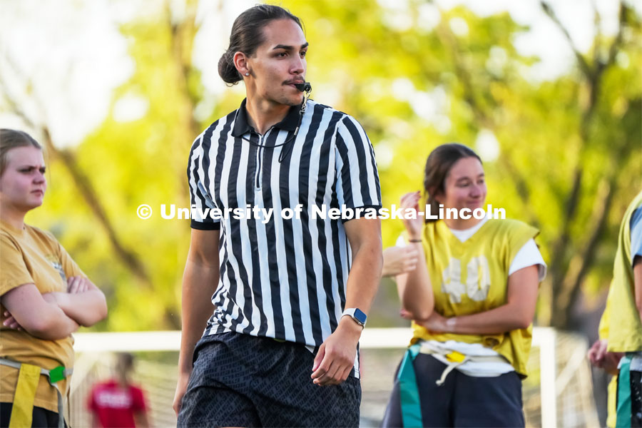 Bennett Yellow Bird a Senior Nutritional Science and Dietetics major officiates intramural football on Mabel Lee Fields. October 2, 2024. Photo by Vienna Oldenhof for University Communication and Marketing.